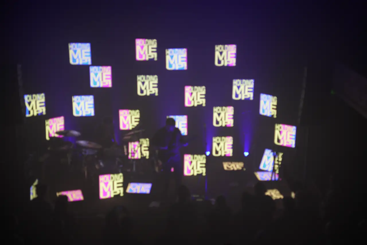 Trustfall Tour: Stephen Stanley under a field of floating LED panels